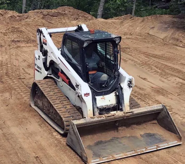 Bobcat T770 compact track loader on a dirt work site